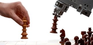 umano gioca a scacchi contro intelligenza artificiale